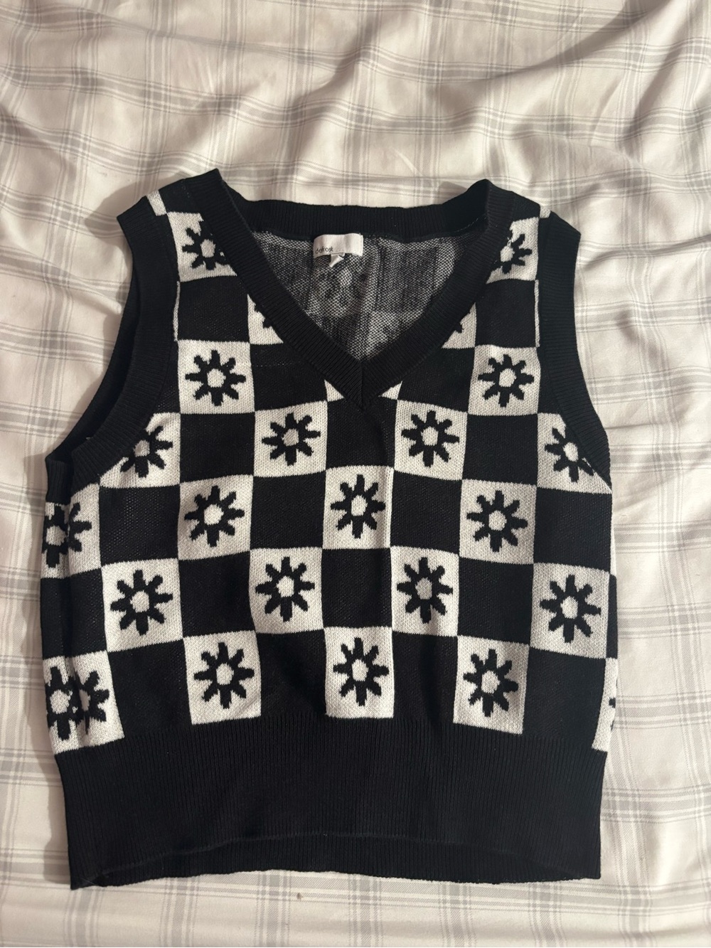 Monochrome Checkerboard Knit Vest with Sun Motif